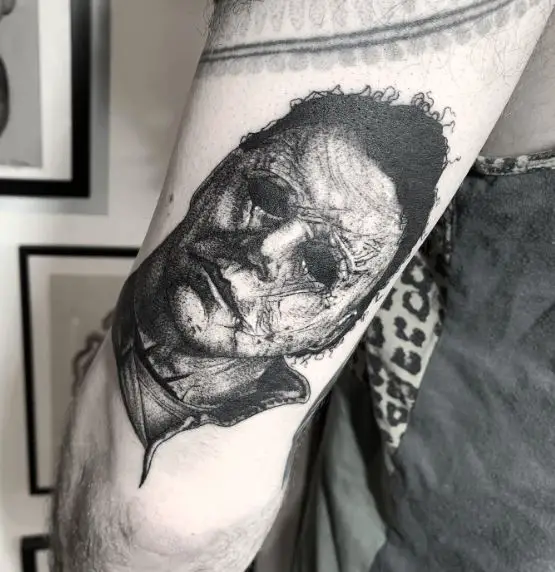 Black and Grey Michael Myers Portrait Elbow Tattoo