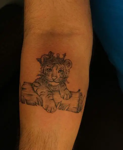 Wood and Tiger Cub with Crown Forearm Tattoo