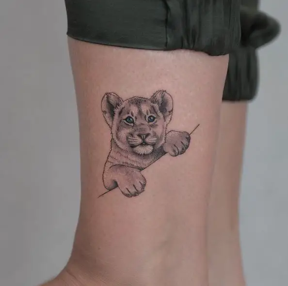 Black and Grey Lion Cub Ankle Tattoo