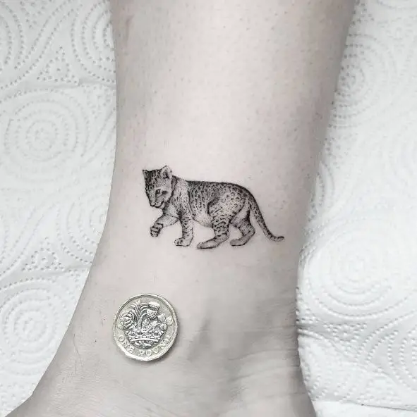 Minimalistic Tiger Cub Ankle Tattoo