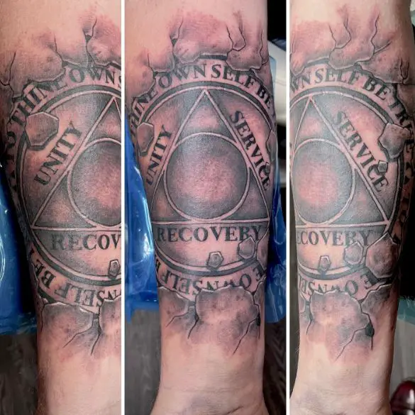 Torn Skin and AA Symbol Forearm Tattoo