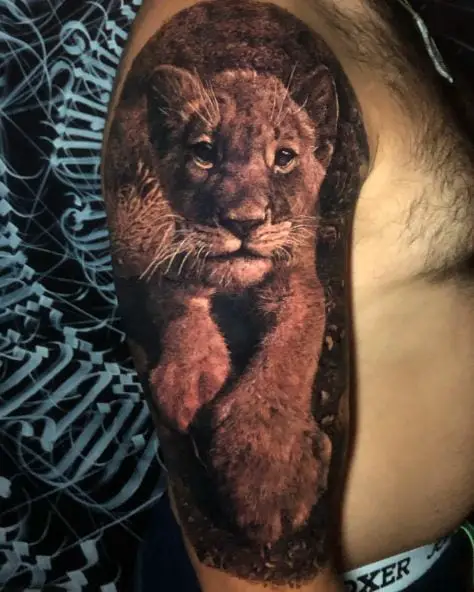 Realistic Crawling Lion Cub Arm Tattoo