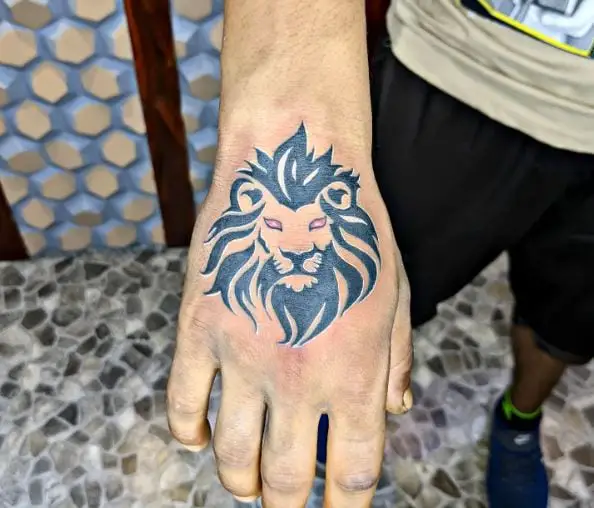 Simple Lion with Red Eyes Hand Tattoo