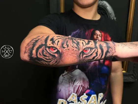 Red Tiger Eyes Forearm Tattoo
