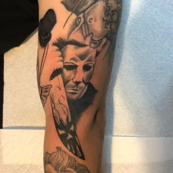 Shaded Michael Myers with Knife Arm Tattoo