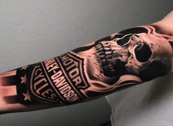 Skull, American Flag and Harley Davidson Logo Forearm Tattoo