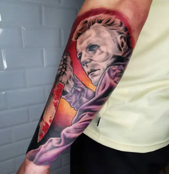 Colorful Michael Myers with Bloody Knife Forearm Tattoo