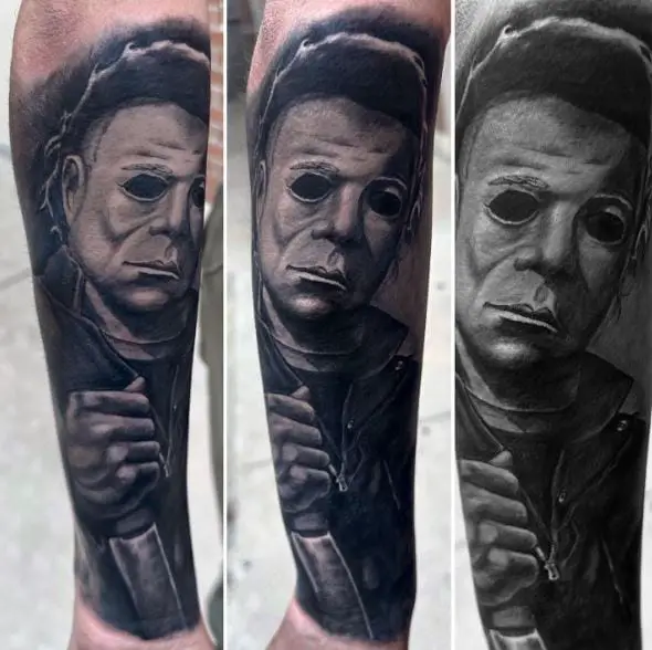 Black and Grey Michael Myers with Knife Forearm Tattoo