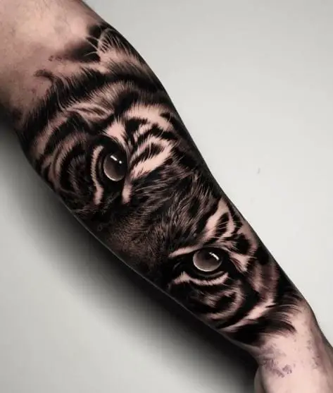 Black and Grey Tiger Eyes Forearm Tattoo
