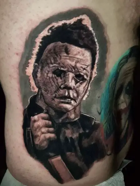 Michael Myers with Scars and Knife Ribs Tattoo