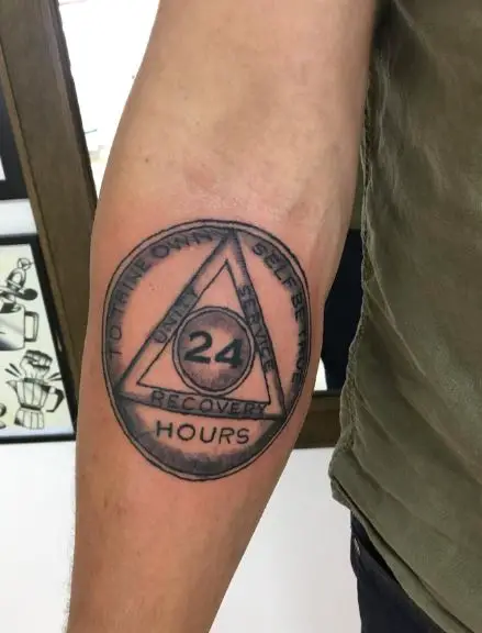 Grey Shaded 24 Hours and AA Symbol Forearm Tattoo