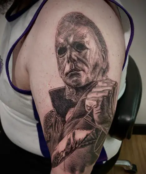 Black and Grey Michael Myers with Knife Arm Tattoo