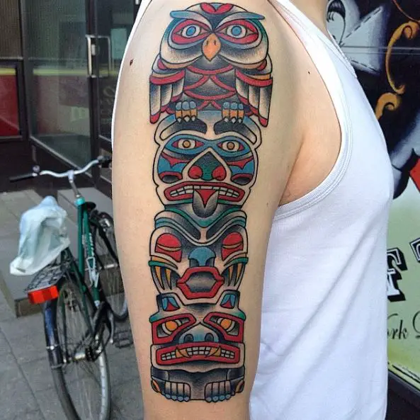 Traditional Colorful Native American Totem Pole Arm Tattoo