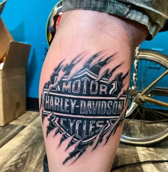 Ripped Skin Harley Davidson Logo Calf Tattoo