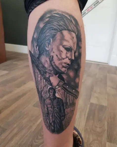 Black and Grey Bloody Knife and Michael Myers Calf Tattoo