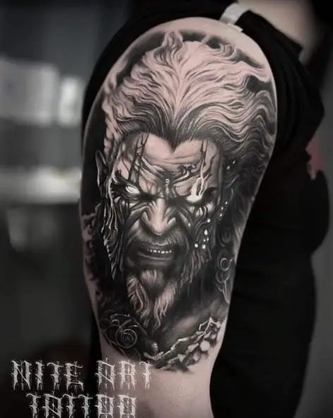 Hades with Eyes on Fire Arm Tattoo