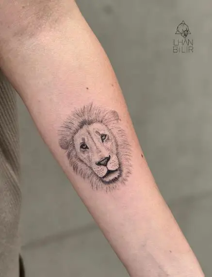 Minimalistic Lion Head Forearm Tattoo