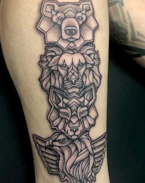 Black and Grey Native American Totem Pole Arm Tattoo