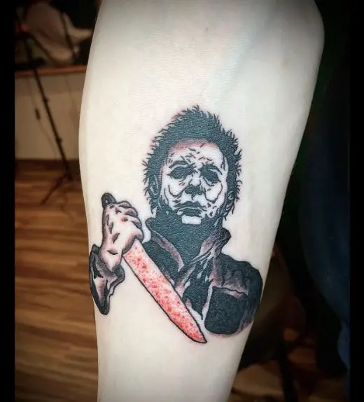 Michael Myers Holding Bloody Knife Forearm Tattoo