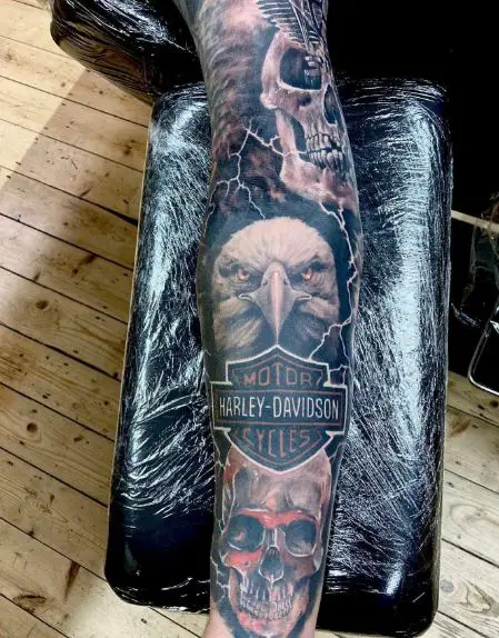Skull, Eagle and Harley Davidson Logo Arm Sleeve Tattoo
