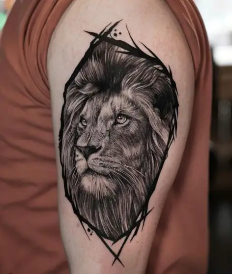 Black and Grey Framed Realistic Lion Head Arm Tattoo