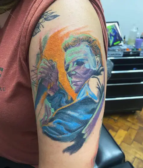 Colorful Michael Myers with Knife Arm Tattoo