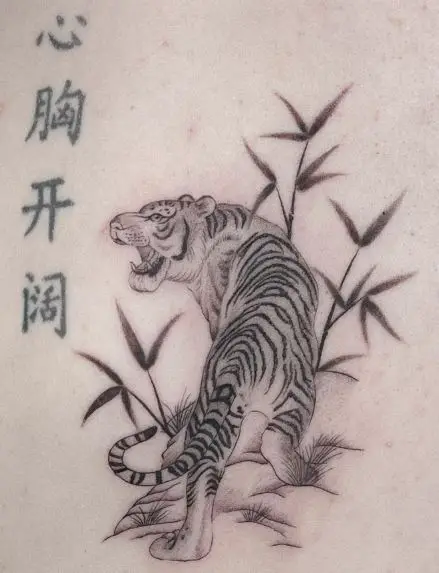 Chinese Script and Tiger Back Tattoo