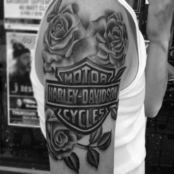 Black and Grey Roses and Harley Davidson Logo Arm Tattoo
