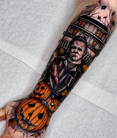 Pumpkins, House, and Michael Myers with Bloody Knife Forearm Tattoo