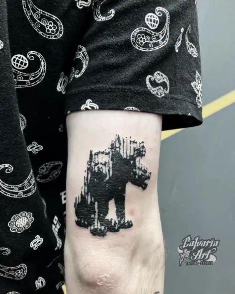 Black Minimalistic Cerberus Arm Tattoo