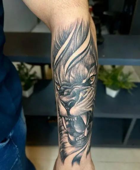 Black and Grey Roaring Lion Forearm Tattoo