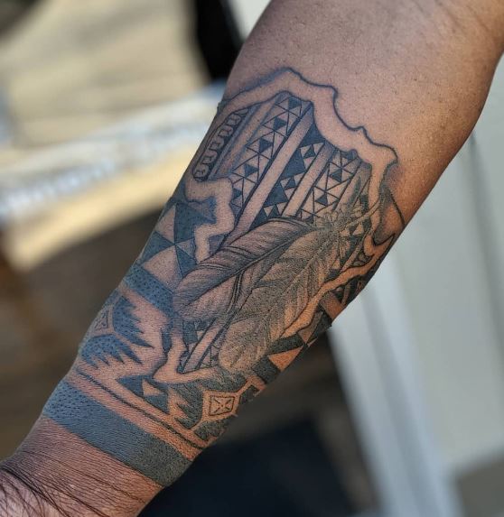Map of Africa and Cherokee Feathers Forearm Tattoo