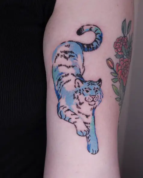 Flowers and Blue Tiger Arm Tattoo
