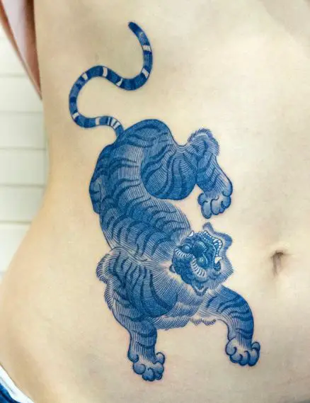 Crouched Blue Tiger Stomach Tattoo