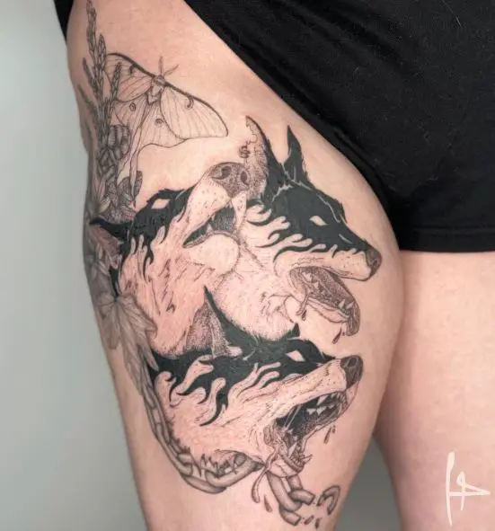 Moth, and Cerberus in Chain Thigh Tattoo