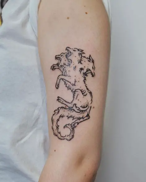Minimalistic White Cerberus Arm Tattoo