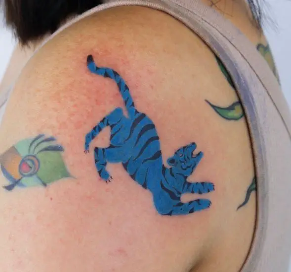 Crouched Blue Tiger Shoulder Tattoo
