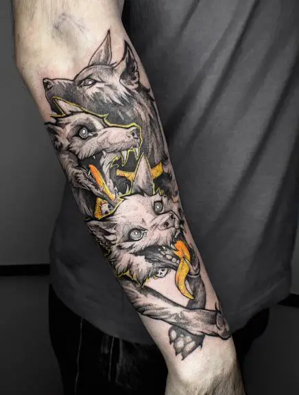 Cerberus with Yellow Tongues Forearm Tattoo