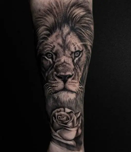 Black and Grey Rose and Lion Forearm Tattoo
