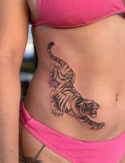 Crouched Black Tiger Stomach Tattoo