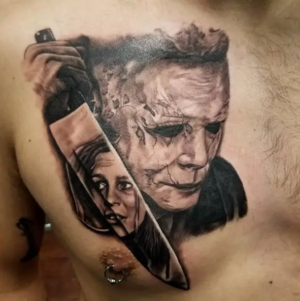 Michael Myers with Knife with Laurie Strode Face on Blade Chest Tattoo