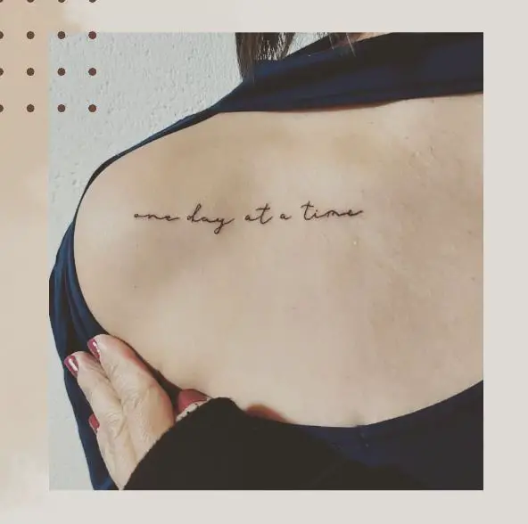 Minimalistic One Day at a Time Sobriety Collarbone Tattoo