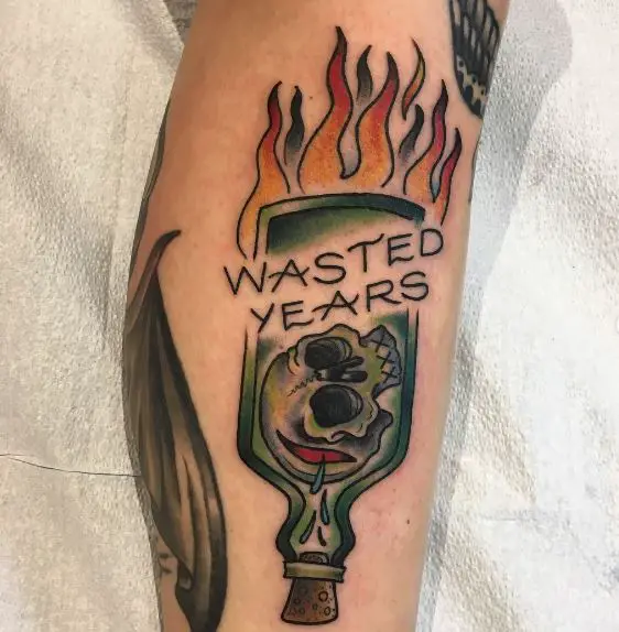 Colorful Bottle on Fire with Skull and Script Sobriety Tattoo