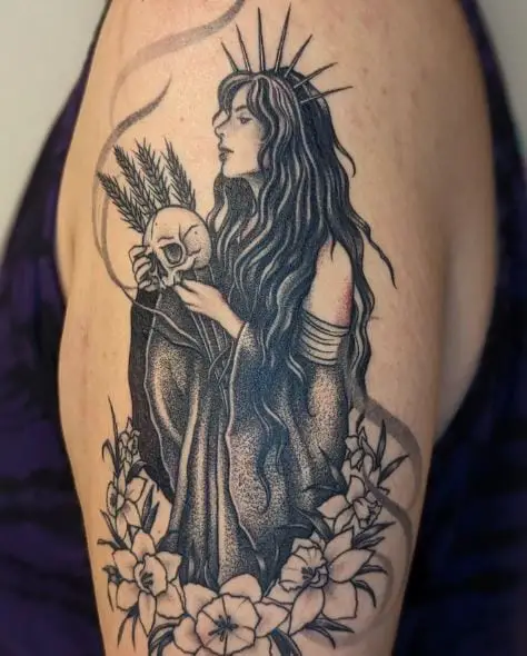 Persephone with Skulls and Flowers Arm Tattoo