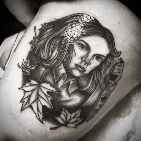 Black and Grey Leaves and Laurie Strode with Knife Tattoo