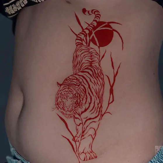 Red Sun and Red Tiger Stomach Tattoo