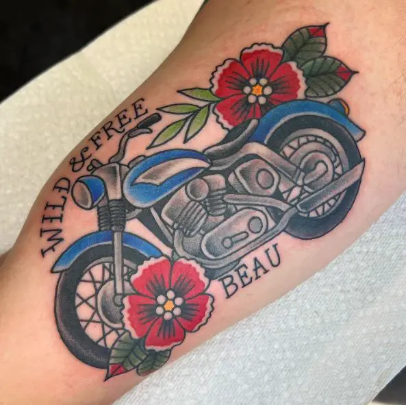 Red Flowers and Blue Harley Davidson Motorcycle with Script Inner Biceps Tattoo