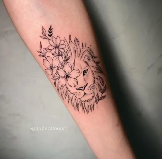 Sketched Flowers and Lion Forearm Tattoo
