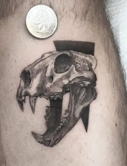 Minimalistic Lion Skull Calf Tattoo