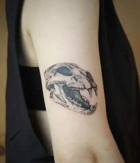 Black and Grey Lion Skull Arm Tattoo